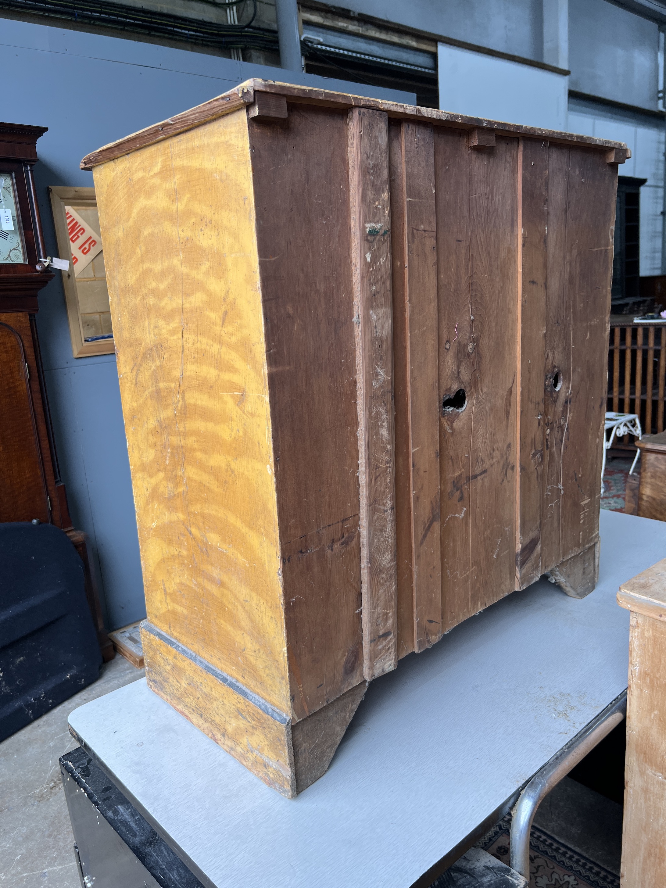 A Victorian pine chest with painted simulated grain, width 90cm, depth 44cm, height 93cm